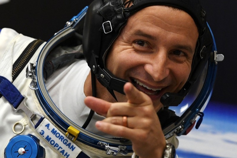 NASA astronaut Andrew Morgan, a member of the International Space Station (ISS) expedition 60/61, reacts as his spacesuit is tested prior to the launch onboard the Soyuz MS-13 spacecraft from the Russian-leased Baikonur cosmodrome in Kazakhstan, in this July 20, 2019 file photo. For decades, the Canadian and American defense agency NORAD has provided updates on Santa Claus's international gift delivery route, but this year, for the first time, US astronauts lent a hand. — AFP