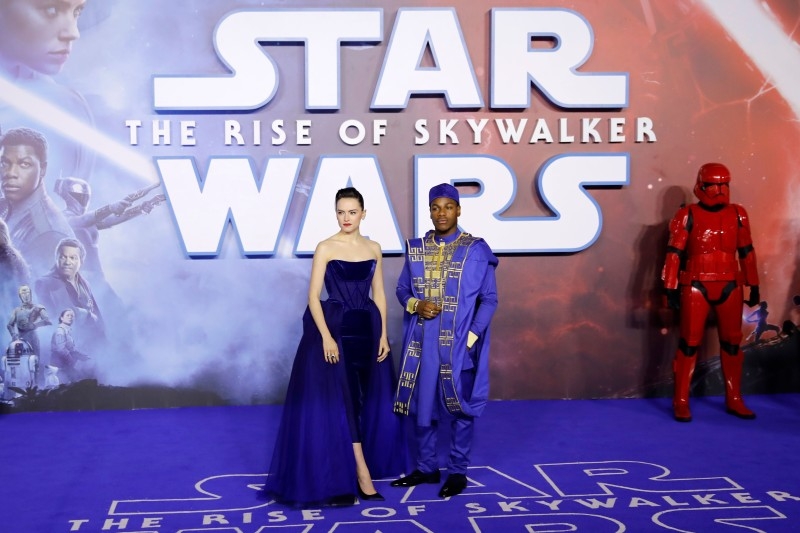 British actor Daisy Ridley, left, and British actor John Boyega, right, pose on the red carpet upon arrival for the European film premiere of Star Wars: The Rise of Skywalker in London in this Dec. 18, 2019 file photo. — AFP