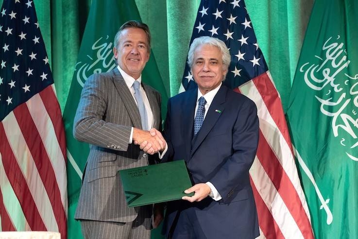 Minister of Commerce and Media Dr. Majed Al-Qasabi presented the trade license to Tim Wilkinson, executive director, strategy and growth at VHO. — Courtesy photo