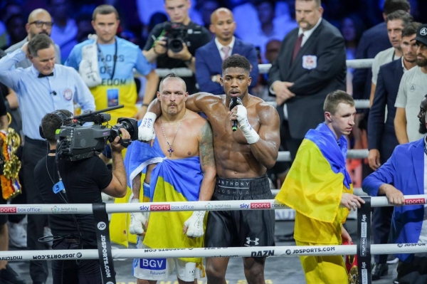 Oleksandr Usyk retains world heavyweight titles with a split decision over Anthony Joshua in rematch in Saudi Arabia. (Photo by Omar Hassan)