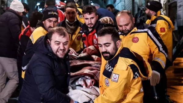 A medical team transfers an injured person to hospital in Istanbul.