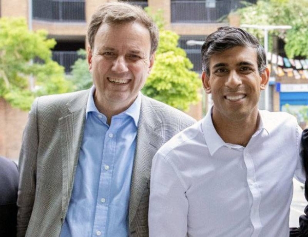 Britain’s Prime Minister Rishi Sunak, right, with the newly-appointed Conservative Party’s Chairman Greg Hands.
