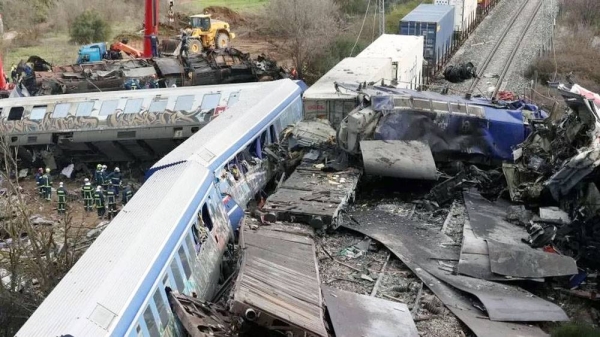 Rescuers search wreckage of deadly Greece train crash. — courtesy Reuters