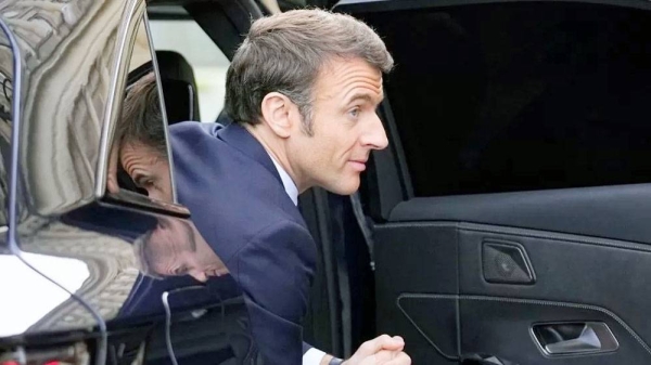French President Emmanuel Macron arrives to attend the National Roundtable on Diplomacy at the Foreign Ministry in Paris on March 16, 2023. — courtesy AFP