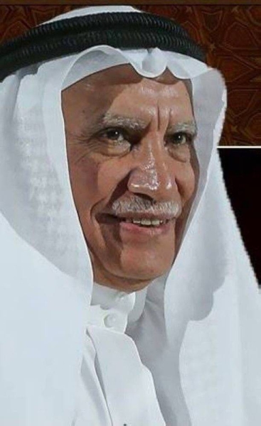Sheikh Abdul Wahhab Abu Suleiman being honored by Custodian of the Two Holy Mosques King Salman (File photo) 