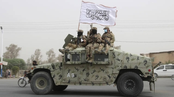 Taliban fighters on patrol during celebrations marking its second anniversary of its recapture of Kabul.