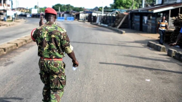 A soldier with the Sierra Leonean military police walks the deserted streets of Freetown after attack. — courtesy AFP