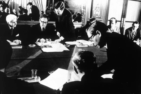 US Secretary of State Henry Kissinger and Vietnamese politician and diplomat Le Duc Tho at the signing the Paris Peace Accords in 1973, which ended US involvement in the war