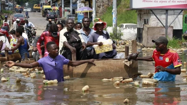 Residents in Kinshasa have been using canoes on the city's flooded roads