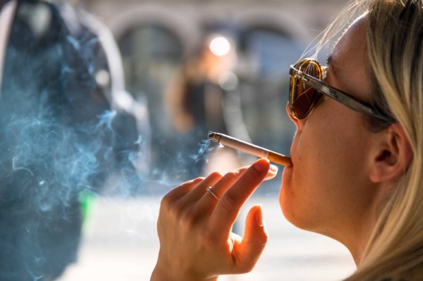 File photo of a woman smoking.