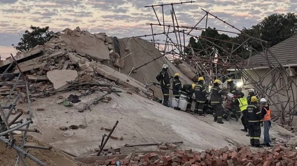 Emergency workers were taking it in turns to work the site, removing concrete blocks and debris by hand