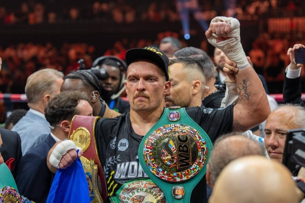 Usyk, who maintained his undefeated record, won the bout by a split decision, now holding all four major boxing belts - WBA, WBC, IBF, and WBO.