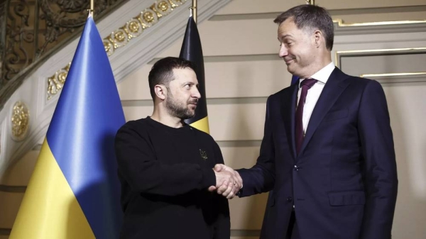 Ukraine's President Volodymyr Zelensky shakes hands with Belgium's Prime Minister Alexander De Croo during their meeting in Brussels, 28 May 2024