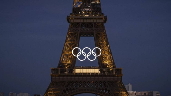 Olympics rings are seen on the Eiffel Tower in Paris on Friday
