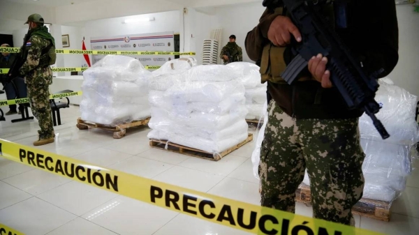 Paraguay's National Anti-Drug Secretariat (SENAD) officers guard drugs seized during an operation in Asuncion, Paraguay, July 16, 2024