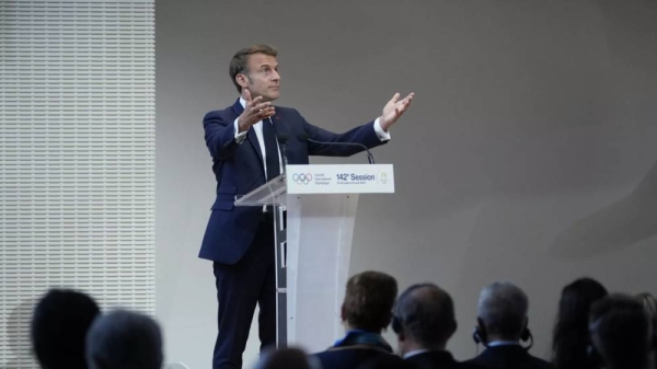 French President Emmanuel Macron speaks, during the IOC Session Opening Ceremony at the Louis Vuitton Foundation ahead of the 2024 Summer Olympics, Monday