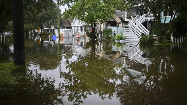 A street is flooded by Tropical Storm Debby in Charleston, South Carolina, on Tuesday, more than a day before the storm would make landfall in the state