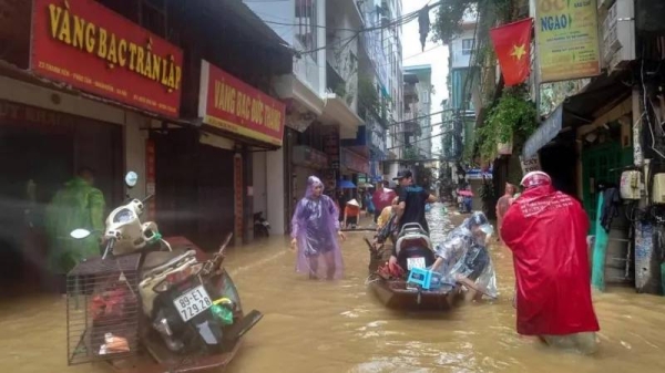 Residents have been using boats to navigate their neighbourhoods as flood waters reached a metre high