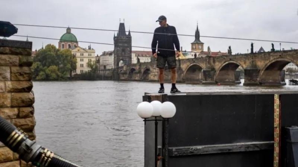 Workers in Prague have been closing floodgates on the River Vltava