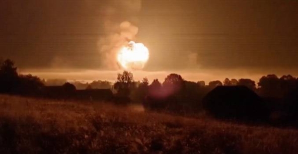 Videograb shows explosions after drone attack on Russian ammunition depot