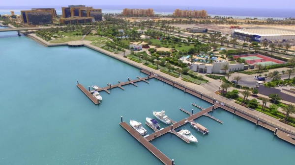 Yachts docked in the marina in the turquoise waters along the shore of King Abdullah Economic City in Rabigh 