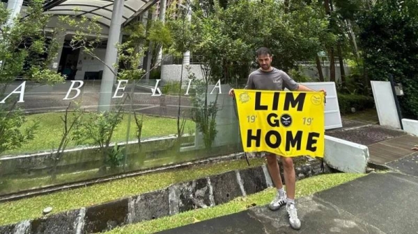 Dani Cuesta posted photos from several locations in Singapore, including from outside what is thought to be Peter Lim's home