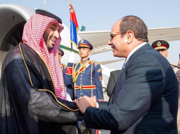 Egyptian President Abdel Fattah El-Sisi welcomes Saudi Crown Prince and Prime Minister Mohammed bin Salman upon his arrival in Cairo on Tuesday.