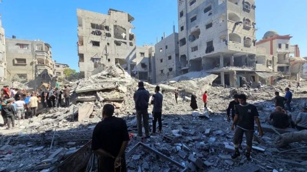 A number of people are still trapped under the rubble in Beit Lahia, local officials say