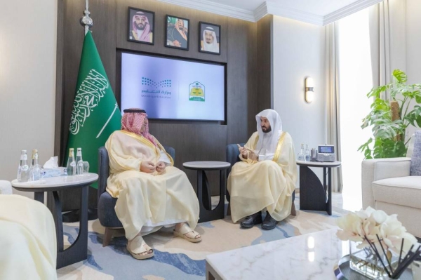 Minister of Justice Walid Al-Samaani and Minister of Education Yousef Al-Benyan during the ceremony of launching  the unified electronic contract in Riyadh.
