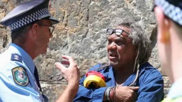 Wayne Wharton, a prominent Indigenous activist from Brisbane, was arrested after shouting anti-monarchist slogans