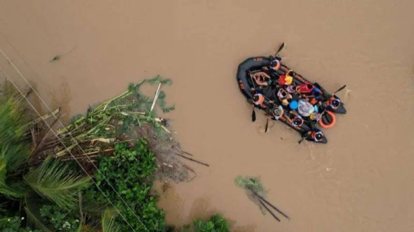 People have been pleading for rescue from the roofs of their flooded homes