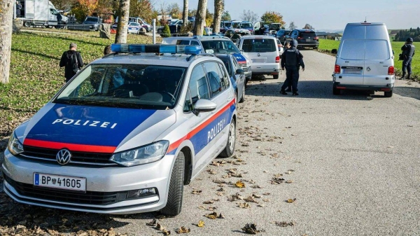 Police patrol near Rohrbach, Upper Austria, after two people were shot dead on Monday