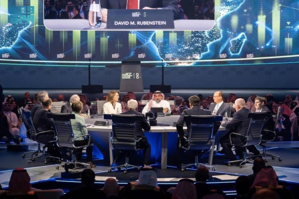 Public Investment Fund Governor Yasir Al-Rumayyan and other speakers attend a dialogue session on geoeconomics as part of the 8th Future Investment Initiative summit in Riyadh on Tuesday.
