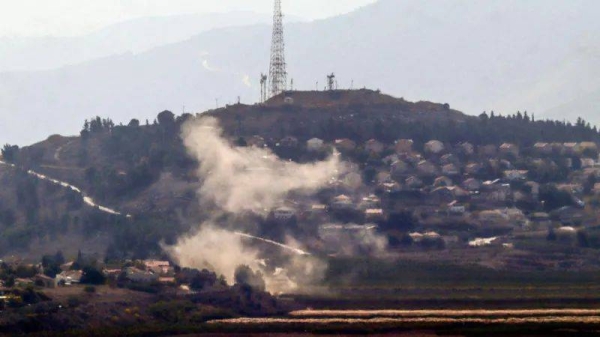 Smoke was seen rising from the Israeli town of Metula following a Hezbollah rocket attack on Thursday