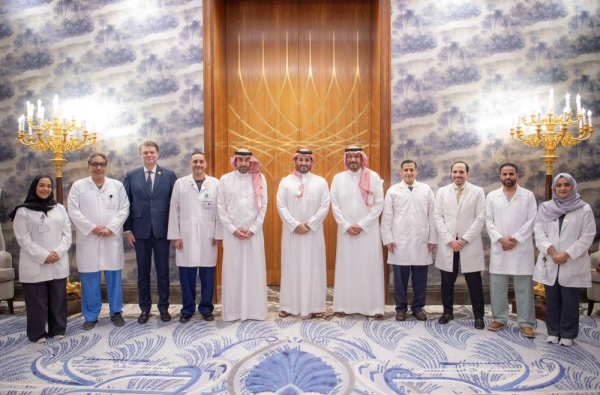 Saudi Crown Prince and Prime Minister Mohammed bin Salman receives the Saudi medical team that who performed the world's first fully robotic heart transplant, in Riyadh on Wednesday.