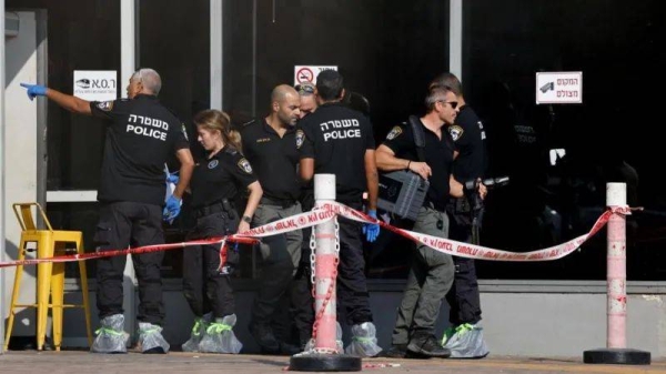 A contingent of Israeli police pictured at the scene of an attack in Beersheba, southern Israel on 6 October