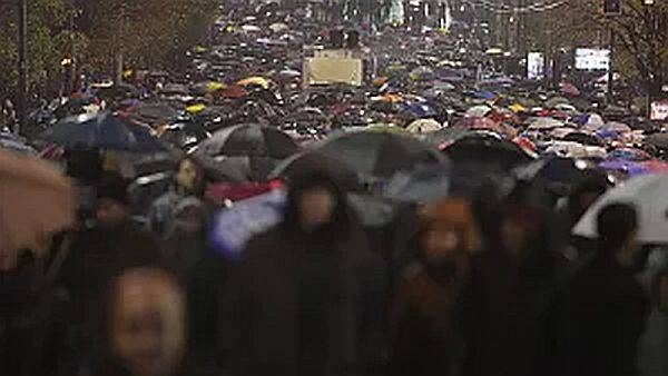 People march during a protest following the collapse of a concrete canopy at the railway station in Novi Sad that killed 14 people, in Belgrade, Serbia, Monday, Nov. 11, 2024