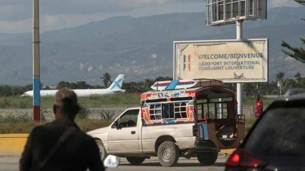 A passenger plane at Toussaint Louverture International Airport last month