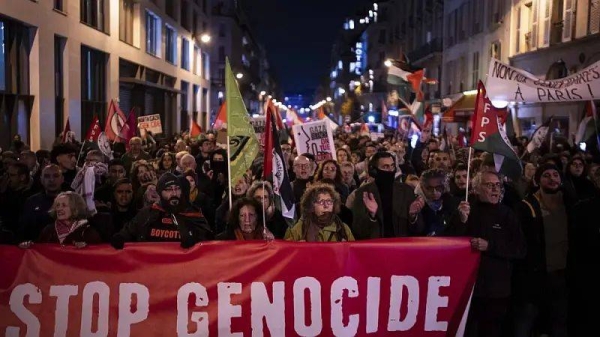 Protesters take part in a rally against the 'Israel is Forever' gala organized by far-right Franco-Israeli figures, in Paris, Wednesday, Nov. 13, 2024