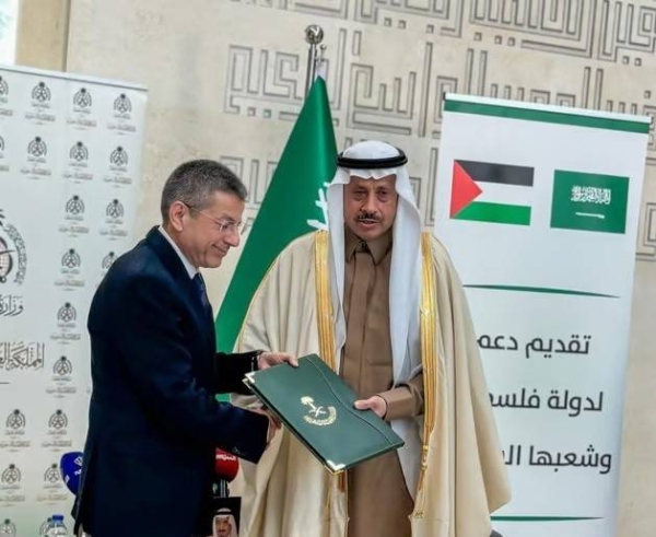 Naif Al-Sudairi, Saudi ambassador to Jordan, non-resident ambassador to Palestine, and consul general in Jerusalem, delivered the third instalment of the financial support to Palestinian Minister of Finance Omar Bitar in Amman on Thursday.
