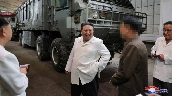 North Korean leader Kim Jong Un visits a key military factory in this undated photo released by North Korea's Korean Central News Agency (KCNA) on August 14, 2023