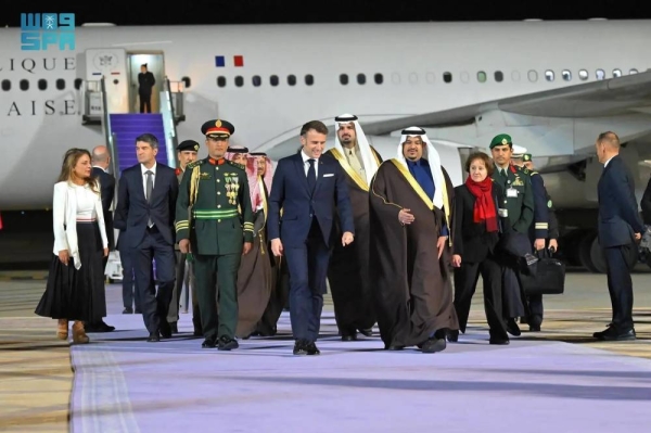 Saudi Crown Prince and Prime Minister Mohammed bin Salman receiving French President Emmanuel Macron at Al-Yamamah Palace in Riyadh on Monday.