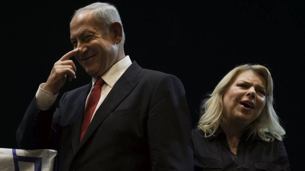 Israeli Prime Minister Benjamin Netanyahu with his wife Sara attend an election campaign rally in Migdal Haemek, 23 October, 2022