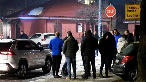 Police officers and civil protection units at the crime scene