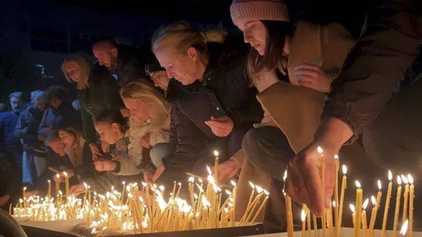 People light candles in Podgorica for the victims of the a shooting rampage in Cetinje, 2 January, 2025