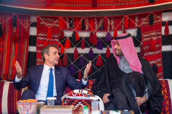 Saudi Crown Prince and Prime Minister Mohammed bin Salman receives Greek Prime Minister Kyriakos Mitsotakis at the winter camp in AlUla on Monday.