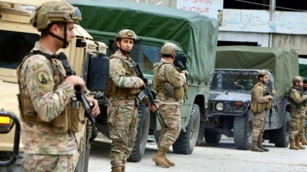 Lebanese army soldiers are guarding roads in southern Lebanon as people return home after the conflict