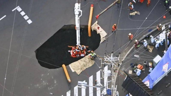 The sinkhole, seen here on Wednesday, has since doubled in size