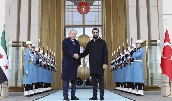 Turkish President Recep Tayyip Erdogan greets Syria's President Ahmad al-Sharaa ahead of meeting in presidential palace in Ankara, Turkey, Tuesday, Feb. 4, 2025