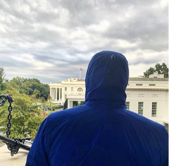 Syrian defector Caesar looks toward the White House after a meeting with the US administration officials in a nearby building (File photo).